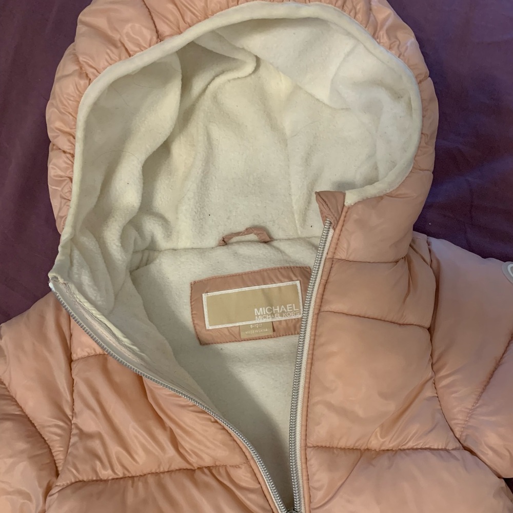 The jacket for 9 to 12 month old baby girl. It’s on a good condition
